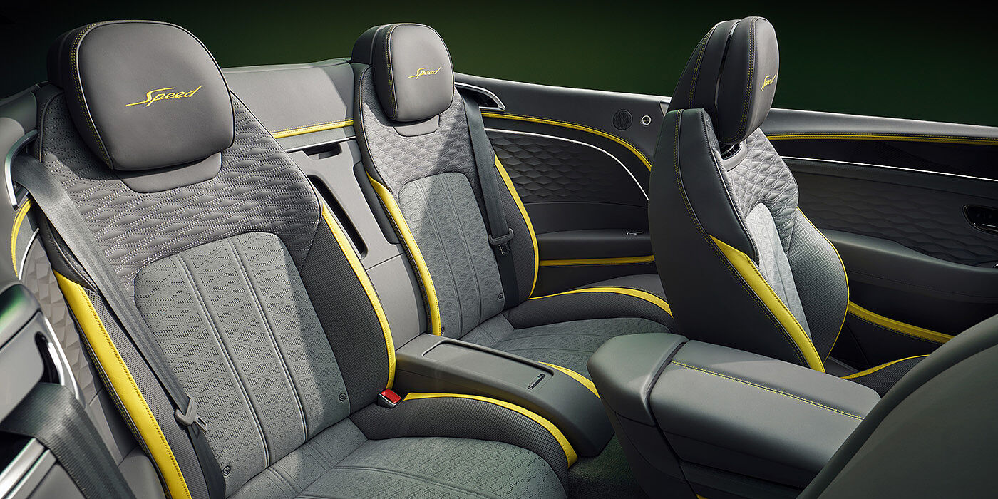 JCT600 Limited Bentley New Continental GTC Speed convertible rear interior with unique Speed colour split in Gravity Grey and Cyber Yellow hide colours, and contrast stitched headrest emblems 