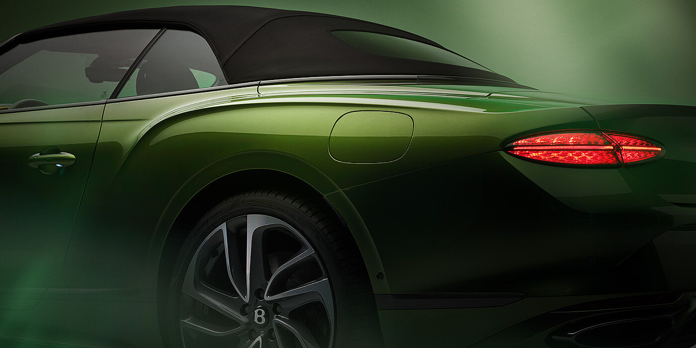 JCT600 Limited Bentley New Continental GTC Speed rear haunch and tail lamp in Tourmaline Green paint and dark tint brightware with black hood up and illuminated head lamps